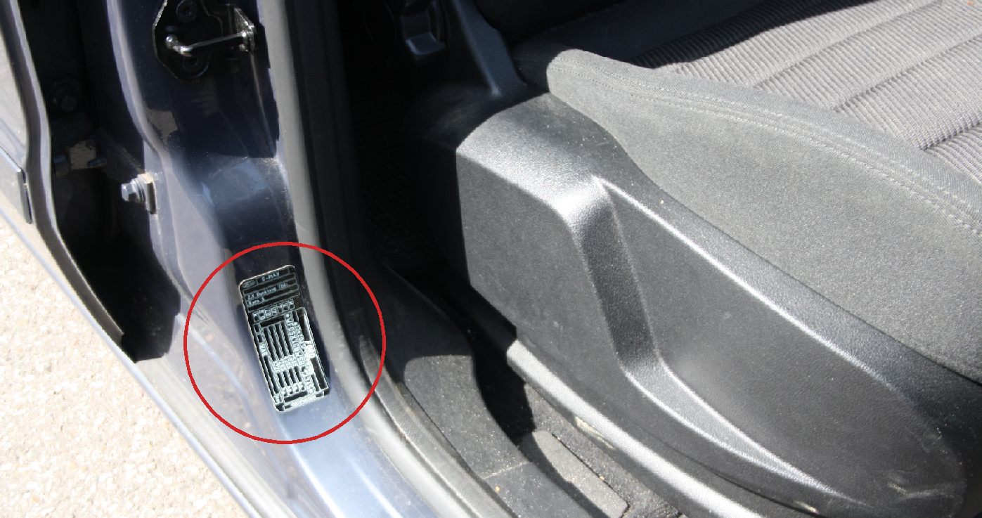 Find vehicle emission standard on car door frame